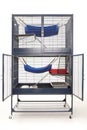 Luxury well equipped ferret cage on white background