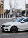 Luxury white BMW in city
