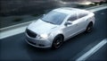 Luxury white car on highway, road. Very fast driving. Wonderfull sunset. Travel and motivation concept. Realistic 4k