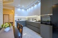 Luxury white and dark grey modern kitchen interior Royalty Free Stock Photo
