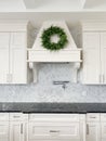 Luxury white kitchen marble herringbone backsplash Royalty Free Stock Photo