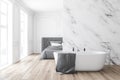 Luxury white marble bedroom and bathroom, tub Royalty Free Stock Photo