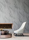 Luxury white marble mock-up wall with tufted white armchairs, brushed metal coffee table and modern built-in fireplace