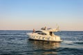 Luxury white motor yacht under way out at sea Royalty Free Stock Photo
