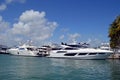 Luxury White Motor Yachts Moored at a marina in southeast Florida Royalty Free Stock Photo