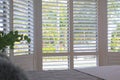 Plantation shutters - selective focus Royalty Free Stock Photo