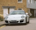 luxury white porsche carrera boxster car fast sportscar sport vehicle transport autos parked