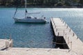 view of luxury yacht docked next to wooden jetty Royalty Free Stock Photo