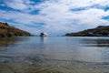 Luxury yacht moored in the middle of the blue transparent calm sea