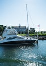 Luxury yacht and sailboat at expensive beachfront property, Cape Cod