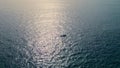 Luxury yacht sailing ocean at summer day. Drone view boat swimming at marine bay Royalty Free Stock Photo