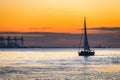 Luxury yacht Sailing on Tagus river at sunset Royalty Free Stock Photo