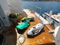 Luxury yacht toys, seabob, paddle board on aft deck of huge motor boat Royalty Free Stock Photo