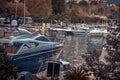 Luxury yachts and boats moored in sea port during sunset Royalty Free Stock Photo