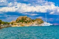 Old fortress and Luxury yachts in Corfu Town Garitsa Bay Greece Royalty Free Stock Photo