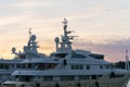 Luxury yachts harbor at golden hour view at Cannes Yacht Charter. Royalty Free Stock Photo