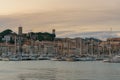 Luxury yachts harbor at golden hour view at Cannes Yacht Charter.