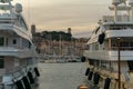 Luxury yachts harbor at golden hour view at Cannes Yacht Charter. Royalty Free Stock Photo