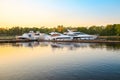 Luxury yachts in marina at sunset. Royalty Free Stock Photo