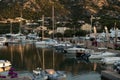 Luxury Yachts moored in a harbor of Porto Cervo on the early sunset, Sardinia, Italy Royalty Free Stock Photo