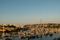 Luxury Yachts moored in a harbor of Porto Cervo on the early sunset, Sardinia, Italy Royalty Free Stock Photo