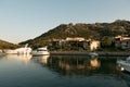 Luxury Yachts moored in a harbor of Porto Cervo on the early sunset, Sardinia, Italy Royalty Free Stock Photo