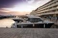 Luxury yachts moored in the marina.