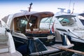 Luxury yachts moored in the marina.