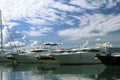 Luxury yachts moored on pier