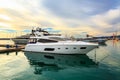 Luxury yachts moored at pier in sea port. Royalty Free Stock Photo