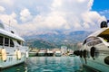 Luxury yachts and sailing ships moored at wharf in Budva marina, Montenegro. Port in sea. White motor boats and sailboats. Royalty Free Stock Photo