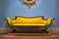 Luxury yellow sofa in front of the blue wall