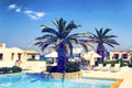 Luxury hotels with crystal clear pool. Crete Island, Hersonissos, Greece Royalty Free Stock Photo
