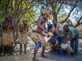 Luzibalule, Namibia - August 13, 2015: Medicine man and others dancing to traditional music, Lizauli Traditional Village