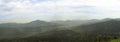Luzicke hory mountains wide panorama, skyline view from hill stredni vrch, green forest and blue sky Royalty Free Stock Photo