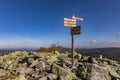 Luzny, Sumava. Lusen, Bavaria, Germany. Tourist signpost at the top of Luzny Hill. Colorful autumn in mountain Sumava. Germany Royalty Free Stock Photo