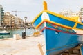 Luzzu boat on the edge of Spinola Bay Royalty Free Stock Photo