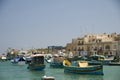 Luzzu boats in marsaxlokk malta fishing village Royalty Free Stock Photo