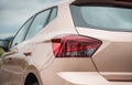 rear quarter view of beige colored SEAT Ibiza Royalty Free Stock Photo