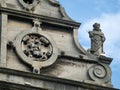 Bas-relief of the Lithuanian coat of arms and a statue of the saint at the Bernardine Monastery