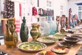 Lviv, Ukraine - August 09, 2020 : garage sale Tlum and Kram. Different traditional ukrainian ceramic dinnerware - plates