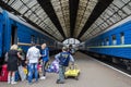 LVIV, UKRAINE - AUGUST 21, 2015: People getting prepared to board a train on the platforms of Lviv train station Royalty Free Stock Photo