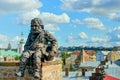LVIV, UKRAINE - AUGUST 22 , 2017 , Awesome sculpture of the chimney sweep siting on the funnel on the roof of the House of Legends