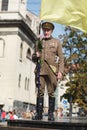 Lviv, UKRAINE - August 24, 2017: A veteran of the Ukrainian Insurgent Army holds a flag of Ukraine