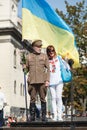 Lviv, UKRAINE - August 24, 2017: A veteran of the Ukrainian Insurgent Army holds a flag of Ukraine