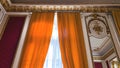 LVIV, UKRAINE - DECEMBER 7, 2019: Beautiful interior with a large window with curtains. Interior in the Potocki Palace.