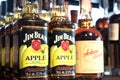 Lviv, Ukraine - February 20, 2022 : Bad Boy liquor store, bottles with Jim Beam apple liqueur infused with Kentucky bourbon