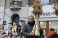 Ukrainians sing Christmas carols as they carry a huge decorated star of Bethlehem and sheaves of wheat in their hands during a