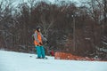 LVIV, UKRAINE - January 12, 2019 - man snowboarding down hill