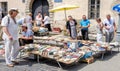 Lviv, Ukraine - July 2015: Men and women choose and buy, and sellers are selling old rare books and vintage items in the book mark Royalty Free Stock Photo